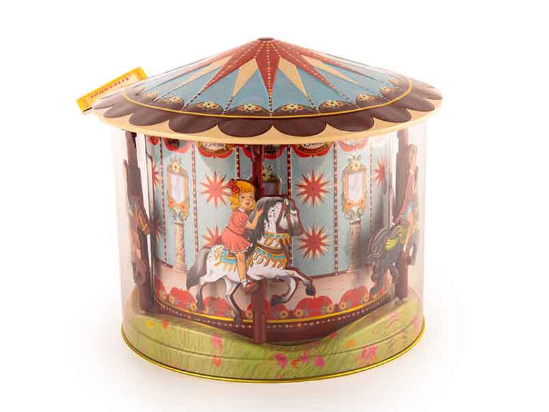 Carrusel de juguete vintage de hojalata relleno de barquillos artesanos
